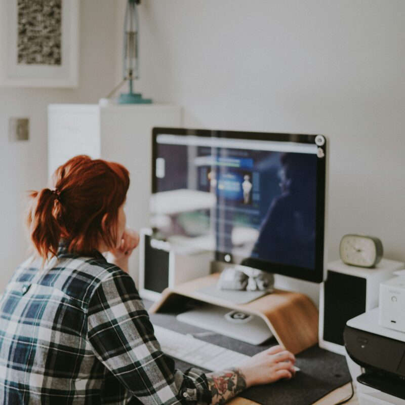 Woman sitting in front of her computer