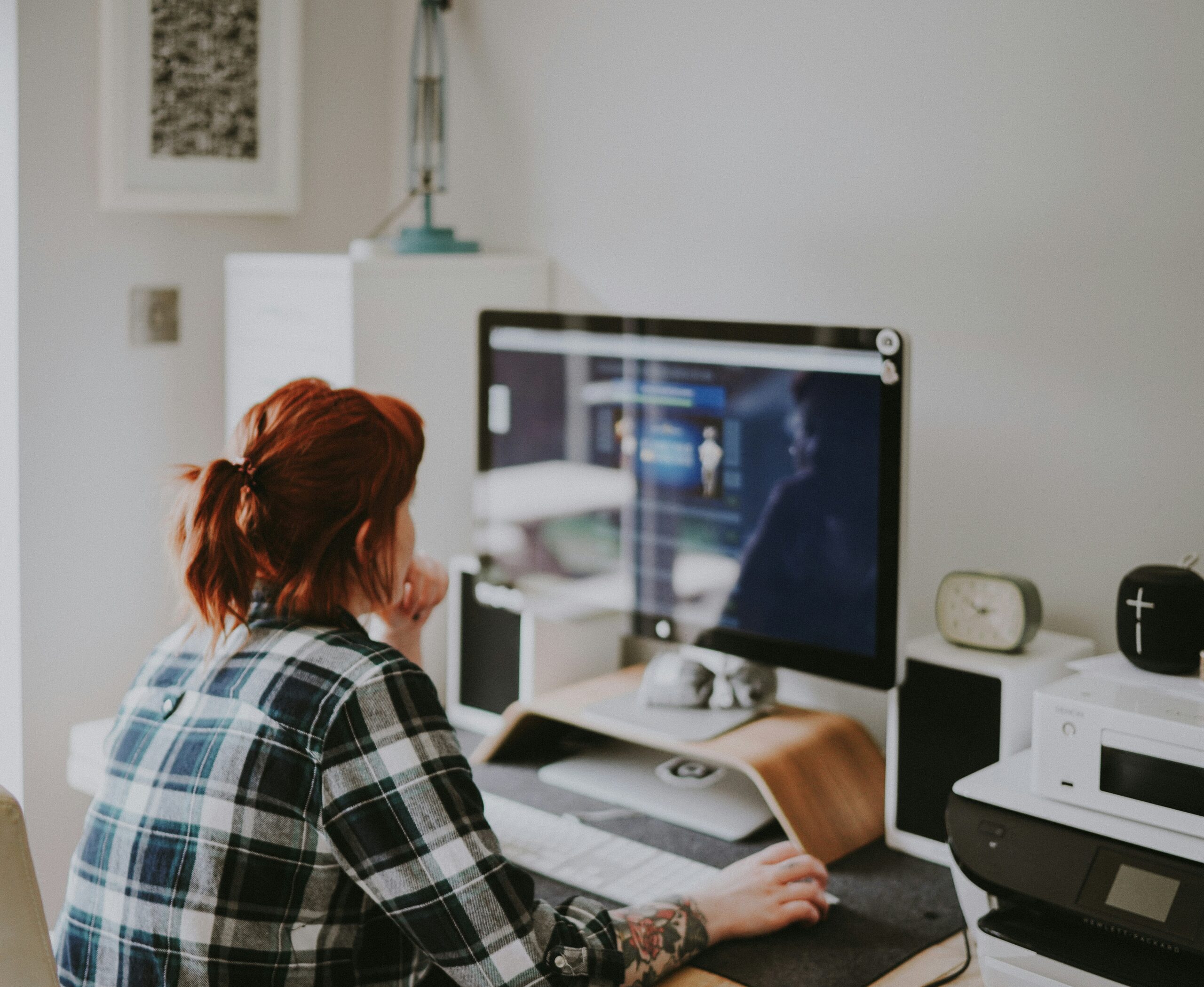 Woman sitting in front of her computer